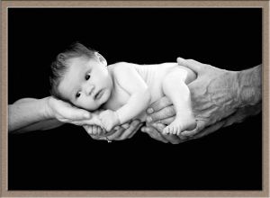 Black-and-White Photography of Baby in Parent's Arms in Lake Oswego, Oregon